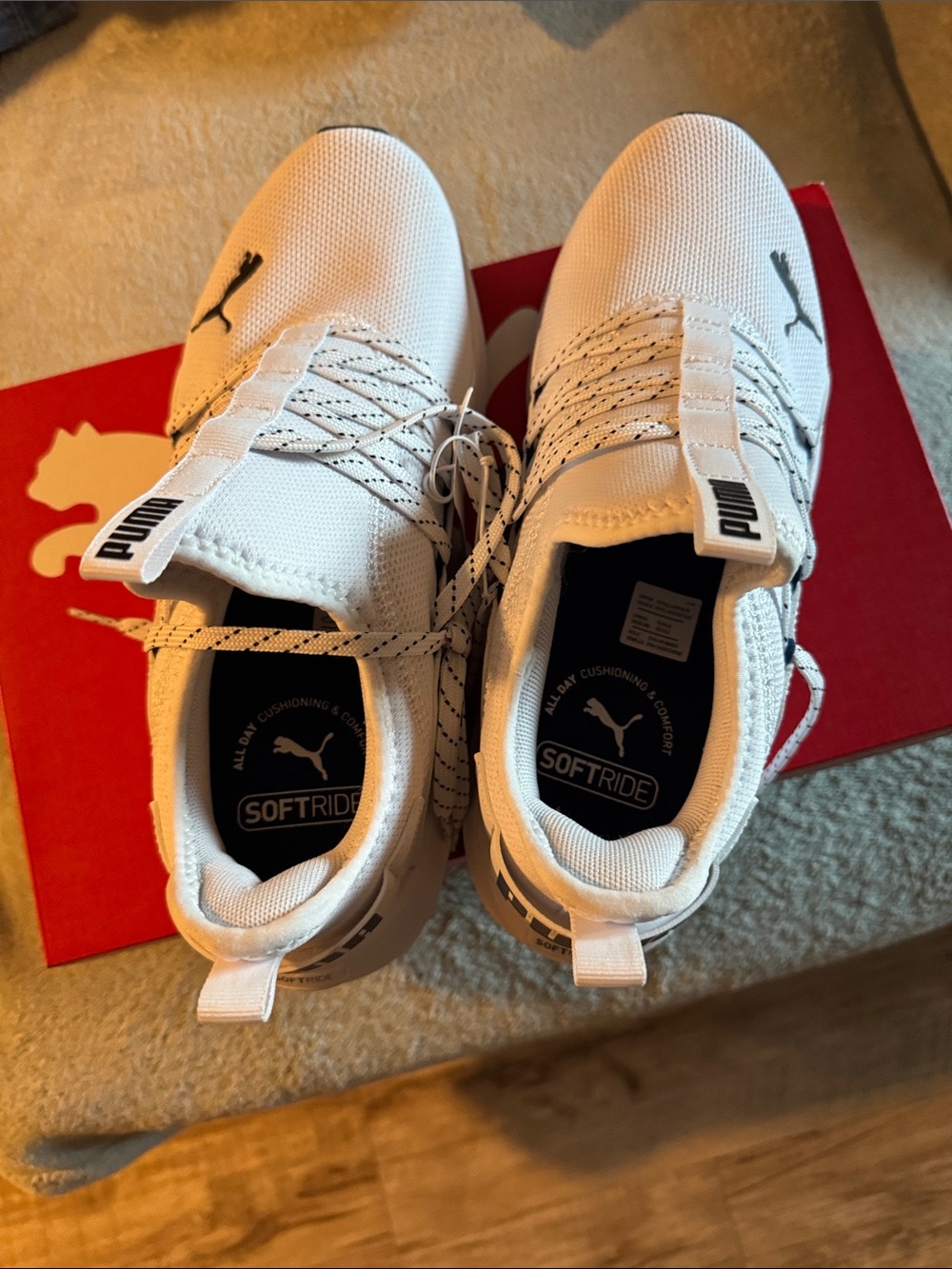 Puma White and Black SOFTRIDE Knit Athletic Shoes